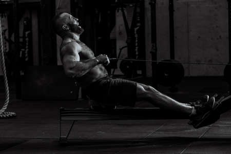 black and white photo tensed body of bodybuilder during workout. heath conceptの写真素材