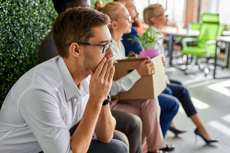 new employees came for an interview, group of diverse people in formal wear sit in a line worry,...