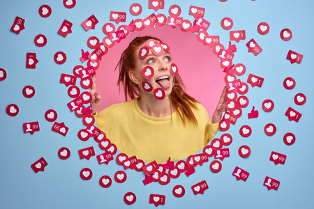 funny redhead woman stand happy by getting many rate for post, likes signs buttons in form of heart...