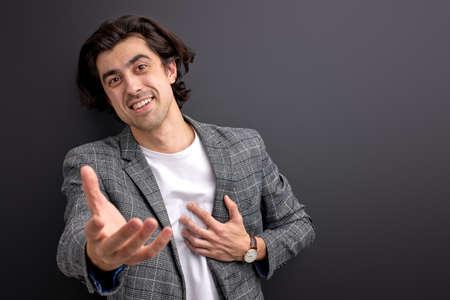 kind nice businessman entrepreneur welcomes new staff employeesの写真素材