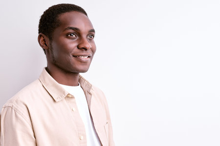 Handsome Good-looking African Man Looking At Side In Contemplation, Think About Futureの写真素材