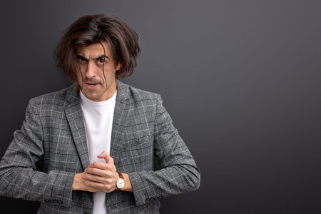 angry man preparing fist, irritated by something