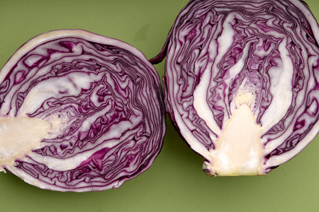 Slices half of cabbage Isolated on green Background Top View. Advertising, Cuisine Menu, Food. close-up. view from above, close-upの写真素材