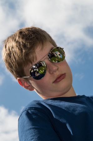 Young man with sunglassesの写真素材