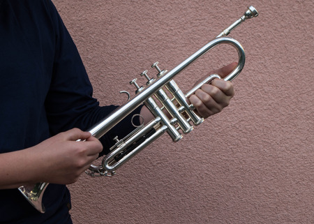 Boy with trumpetの写真素材