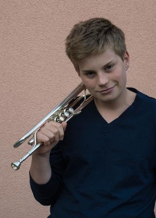 Young man with trumpetの写真素材