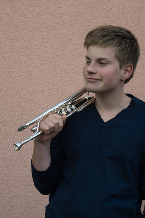 Young man with trumpetの写真素材