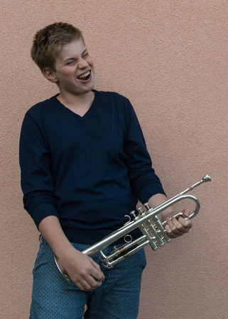 Young man with trumpetの写真素材