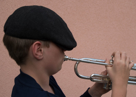 Young man with trumpetの写真素材