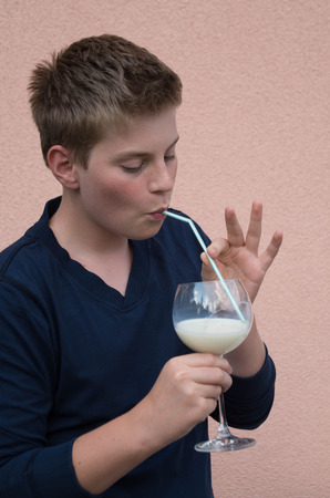 boy with a glass of milkの写真素材