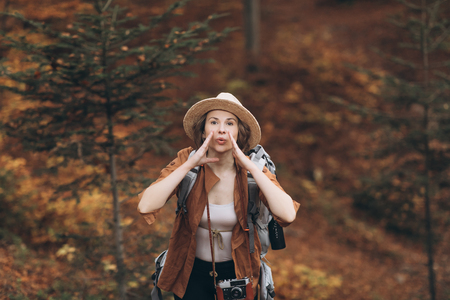 Portrait of a girl who got lost in the woods. The girl who travelsの写真素材