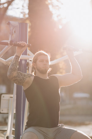 Athlete Sports Man Training Outdooors. Fitness, sport, exercising, training and lifestyle concept -...