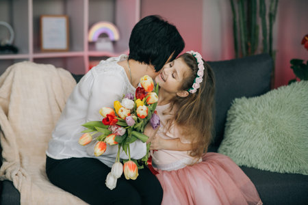 Happy Mothers Day Joy. Kissing and hugging happy family. Beautiful Mother And her little daughter....