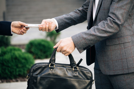 Two unrecognized business partners shaking hands. Colleagues just made good deal. Business relationship. Successfully made deal. Handshake - business people shaking handsの写真素材