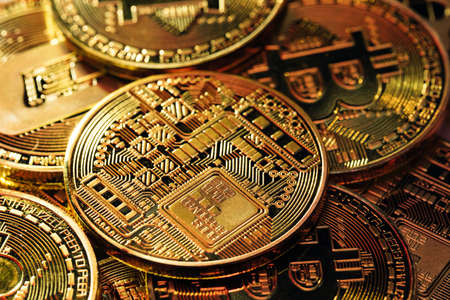 Golden Bitcoins. New virtual money. Mining Golden Bitcoins. Bitcoins coins isolated on background. Crypto currency, bitcoin. BTC, Bit Coin. Blockchain technology.の写真素材