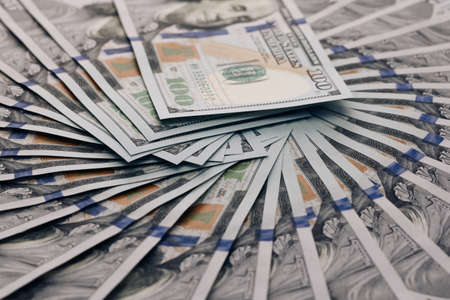 Portrait of President Benjamin Franklin for 100 American dollars cash money. 100 USA dollars banknotes. Closeup new american one hundred dollar billsの写真素材