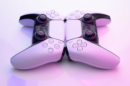 Lviv, Ukraine - February 27 2021: Two joysticks from Sony PlayStation 5 TV game console. White...