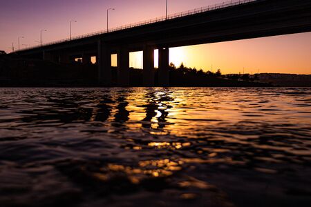 sunset, bridge and lake skyline colorsのeditorial素材