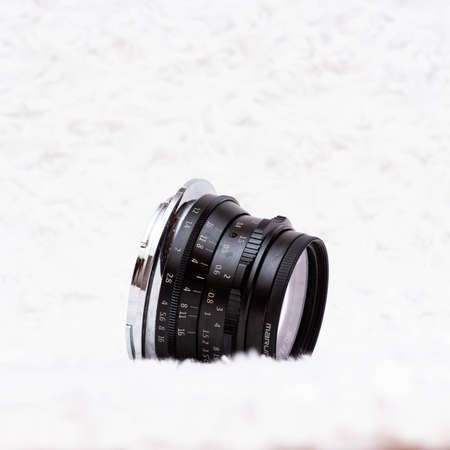 Nikon Z50 with 7artisans 35mm f1.2 manual focus lens isolated on white backgroundのeditorial素材