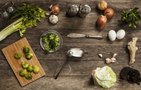 cabbage with vegetables on an old wooden table. view from aboveの写真素材