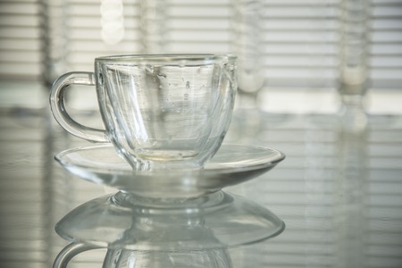 empty cup and saucer on the table. close-upの写真素材
