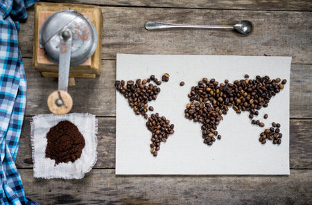 ground coffee, an old hand grinder