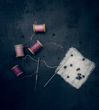 vintage. crochet hooks, lace, old wooden spool of thread