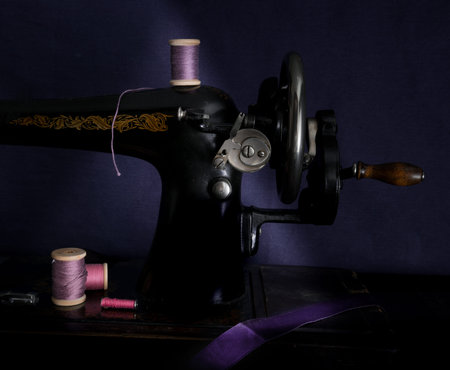 Classic retro style manual sewing machine ready for work.