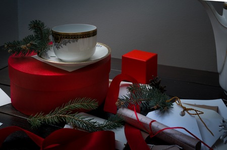 ancient antique cup on the Christmas table with presents letters, envelopes and invitations Santaの写真素材