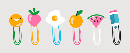 Set of colorful paper clips decorated with smile face, strawberry, watermelon slice, pencil. Cute childish stationery clip art. Flat doodle vector illustrationのイラスト素材
