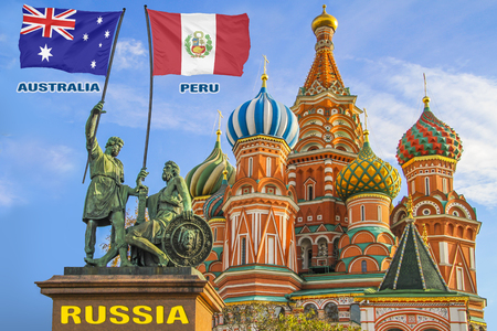 Flags of Australia and Peru being held by two warriors on a statue in front of a Saint Basil's Cathedral in Moscow, Russiaの写真素材