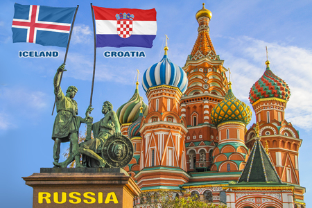 Flags of Iceland and Croatia being held by two warriors on a statue in front of a Saint Basil's Cathedral in Moscow, Russiaの写真素材