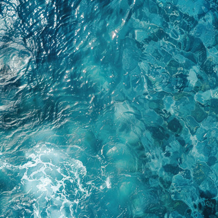 Blue sea water surface texture background. Top view with copy space.