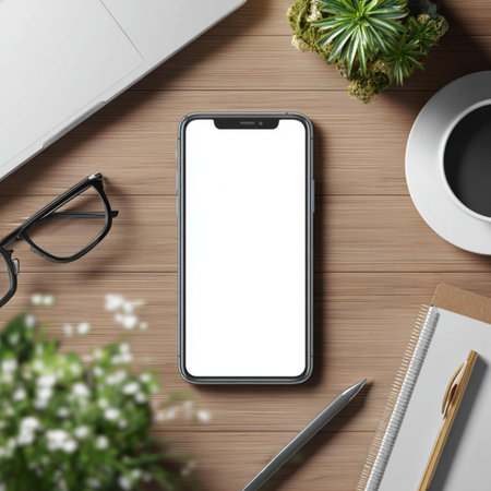 Top view of modern workplace with blank screen smartphone and office supplies. Mock up
