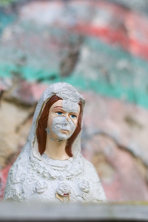 Virgin Mary broken statueの写真素材
