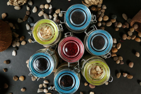 A collection of jars filled with different types of food, showing the variety and diversity of the contents.の写真素材