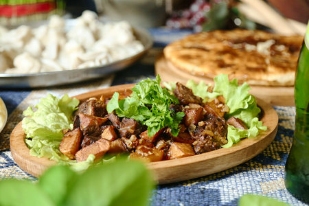 A mouth-watering close-up of a plate filled with delectable food, perfectly arranged on a table.の写真素材