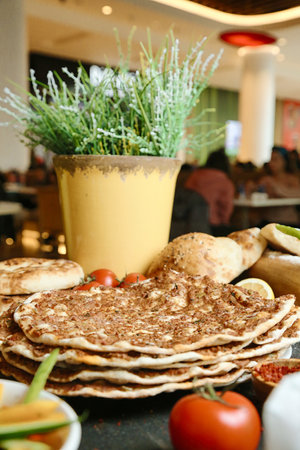 A table filled with various types of food, creating a bountiful arrangement.の写真素材