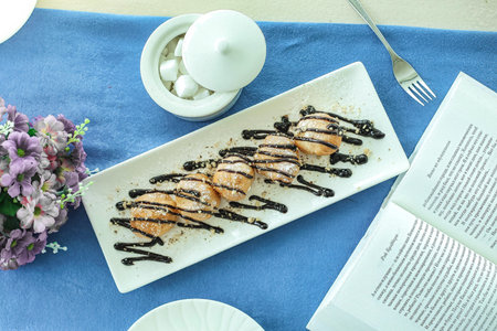 A mouthwatering plate of food featuring a variety of delectable ingredients with rich chocolate...