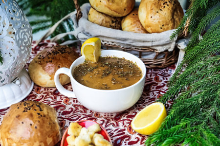 A table adorned with fresh bread and a steaming bowl of soup, ready to be enjoyed.の写真素材