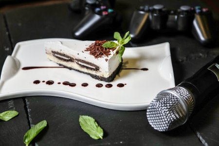 A delicious piece of cake resting on top of a clean and elegant white plate.の写真素材