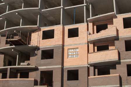 Concrete and brick construction building close-upの写真素材