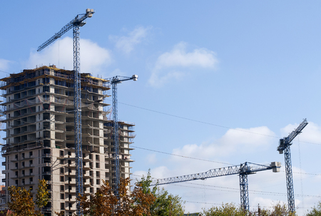 New high-rise buildings in the frame construction cranesの写真素材