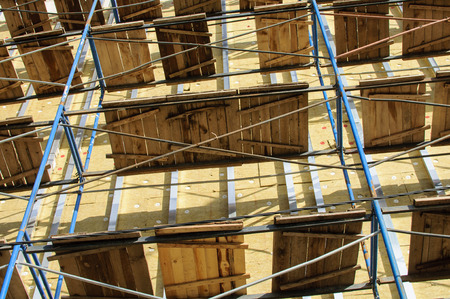 The wall at home with scaffolding. Bottom view.の写真素材