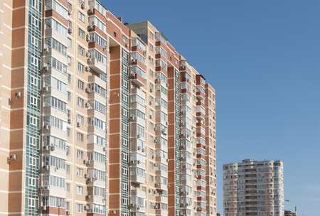 Two new modern houses against the blue skyの写真素材