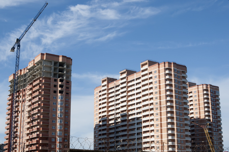 Three buildings at the stage of completion of the adjacentの写真素材
