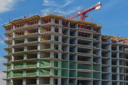Side view of the building under construction for cast-in-concrete technologyの写真素材