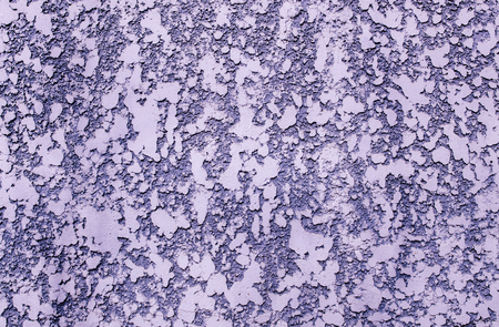 Homogeneous spotted rough texture stucco wall lilacの写真素材