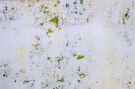 Gray metallic background with old paint flakes.の写真素材