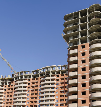 Fragment monolith-brick high-rise buildings up close.の写真素材